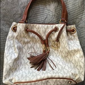Cream color shoulder bucket MK bag